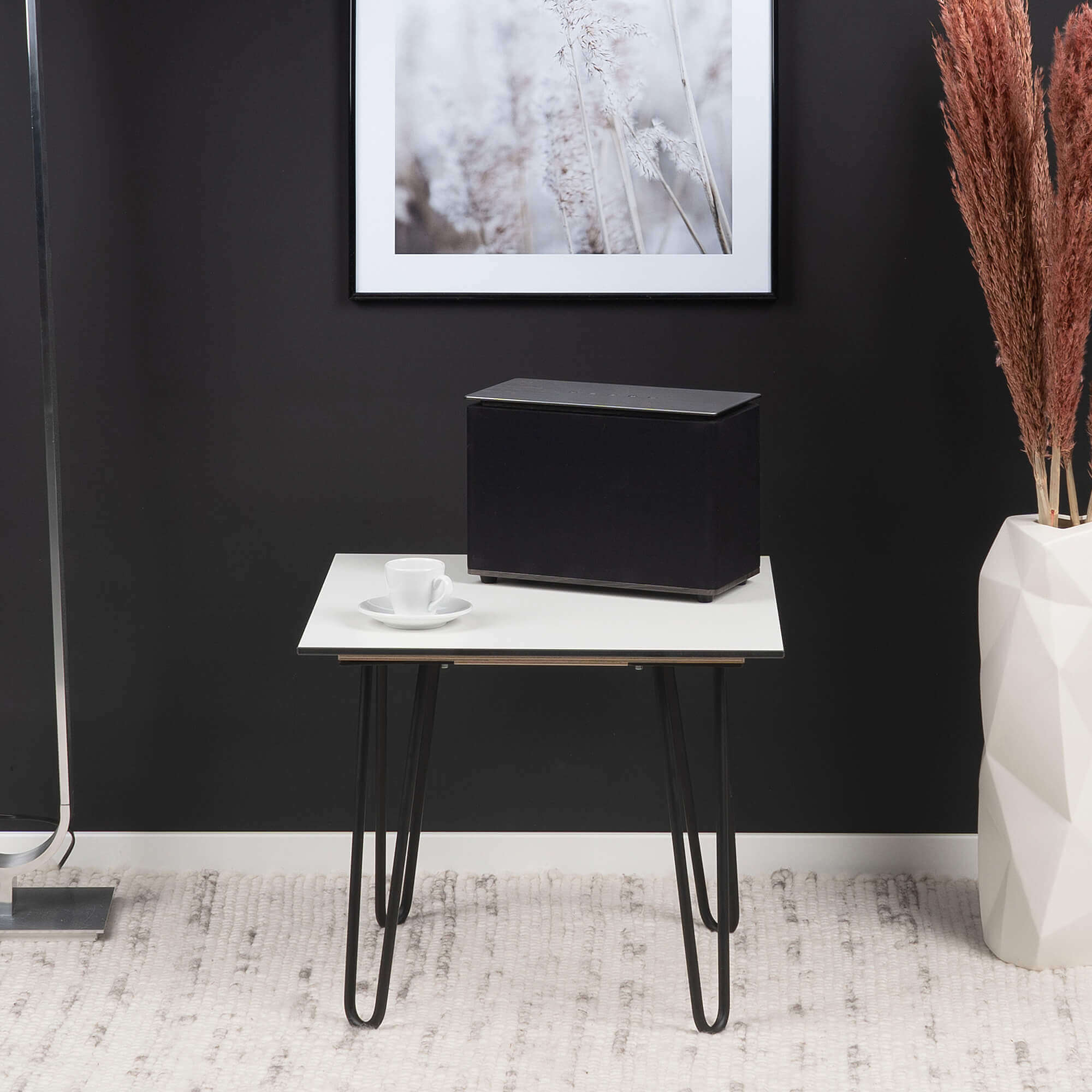 White-designer-bedside-table-black-metal-frame